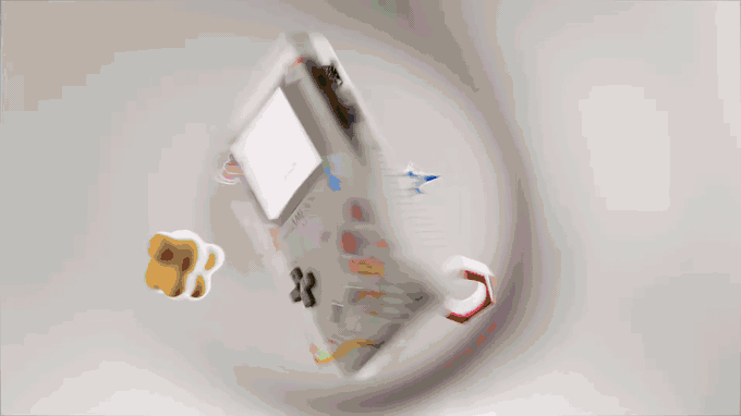 A clear Game Boy spins in a white studio as a bright green Flora cartridge flies into frame