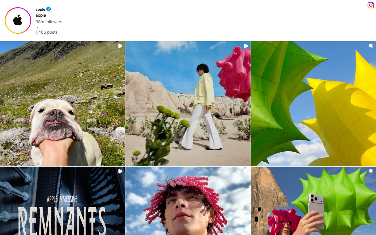 Apple's public Instagram profile, a grid of colourful Shot on iPhone posts